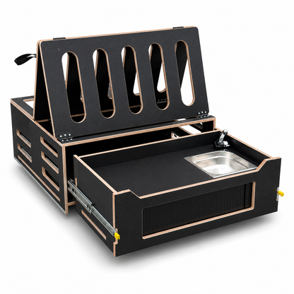 Slide-out van kitchen with stainless steel sink on the Discovery camping pod