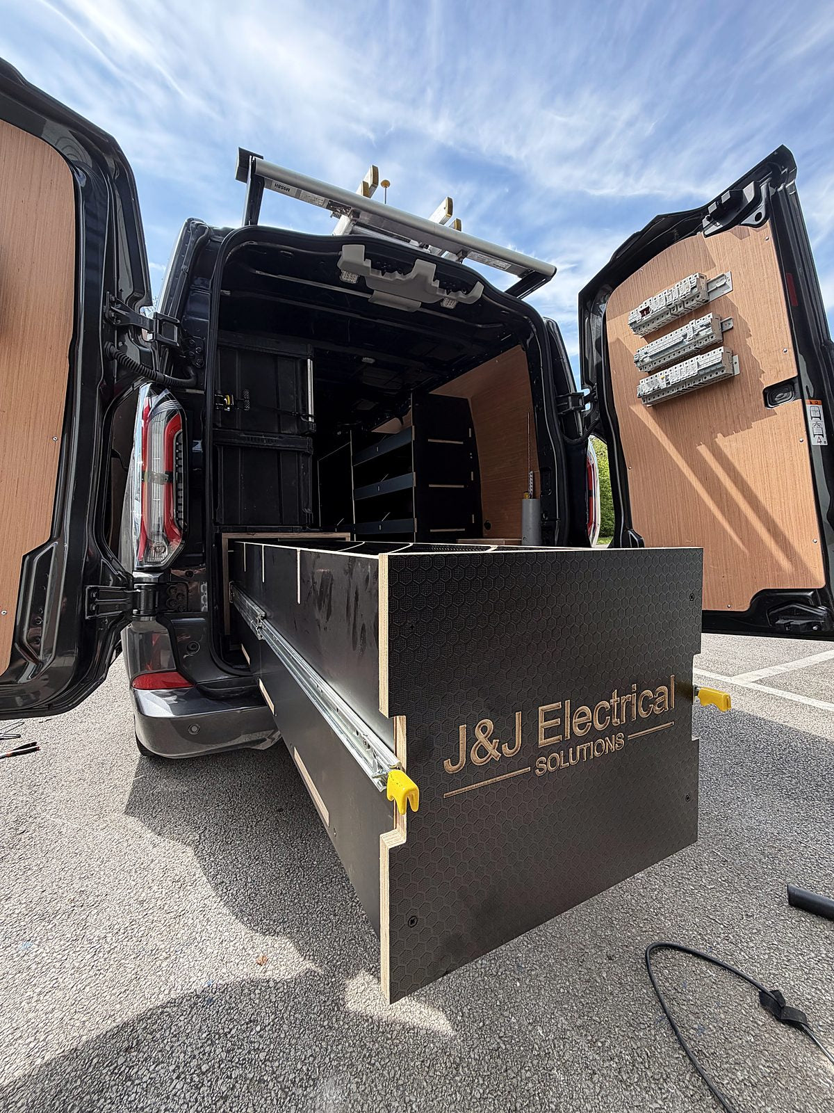 Logo engraved for J&J Electrical
